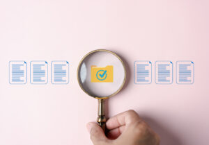 Document Management Checking System, online documentation database and process manage files, Magnifier check focus to document folder, documentation. Corporate business technology concept.